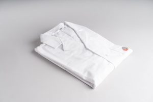 Bild: Labormantel mit Nawi-Logo